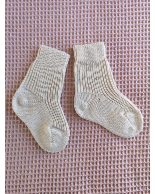 Babysocka i 100% ekologisk merinoull - Naturvit