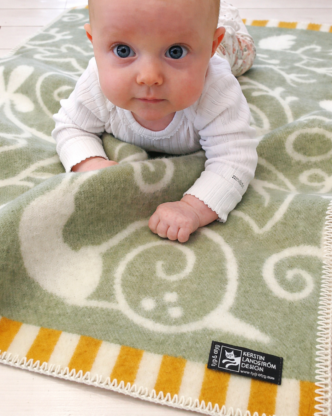 Barnfilt LILLA SNIGEL - Ljusgrön - 100 % lammull – Kerstin Landström Design
